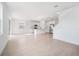 Spacious living area showcasing an open floor plan with tile flooring and natural lighting at 6018 Jensen View Ave, Apollo Beach, FL 33572