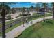 Walking path with Gathering biking, lush landscaping, and benches for community enjoyment at 6018 Jensen View Ave, Apollo Beach, FL 33572