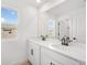 Bathroom featuring a double sink vanity with modern fixtures and plenty of counter space at 6026 Jensen View Ave, Apollo Beach, FL 33572