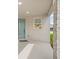 Welcoming front porch area, with stone pillar, offering an inviting entry into the home at 6026 Jensen View Ave, Apollo Beach, FL 33572