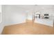 Bright living area with tile floors is adjacent to a modern kitchen at 6026 Jensen View Ave, Apollo Beach, FL 33572