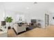 Bright living room with a comfortable seating arrangement and stylish decor at 6026 Jensen View Ave, Apollo Beach, FL 33572