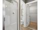 Bright bathroom showcasing a glass-enclosed shower and a toilet room at 6034 Jensen View Ave, Apollo Beach, FL 33572