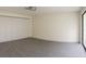 Inviting bedroom with sleek floors, closet, and natural light at 7314 Patio Row, Hudson, FL 34667