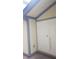 Inviting front porch with double doors, perfect for relaxing at 7314 Patio Row, Hudson, FL 34667