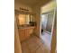 Ensuite bathroom featuring vanity with dual mirrors and a glass enclosed shower at 2305 De Vore St, North Port, FL 34291