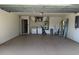 Spacious garage featuring white walls and mechanicals and a washer and dryer at 2305 De Vore St, North Port, FL 34291