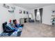 Large bonus room or bedroom features a comfy gaming area with a game-themed area rug at 5424 Companion Ln, Tampa, FL 33619