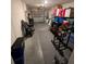 Spacious garage with storage and workout equipment, offering functionality and convenience at 5424 Companion Ln, Tampa, FL 33619