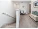 Upstairs loft area with a desk and bench provides an additional living or workspace at 5424 Companion Ln, Tampa, FL 33619