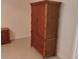 Unique bedroom armoire with drawers and cabinet doors providing ample storage at 5905 Cleveland Dr, Punta Gorda, FL 33982