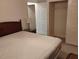 Bedroom featuring a double bed and closet at 5905 Cleveland Dr, Punta Gorda, FL 33982