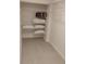 Walk-in closet with ample shelving for optimal storage and organization at 5905 Cleveland Dr, Punta Gorda, FL 33982
