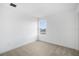 Cozy bedroom with neutral carpet, bright window, and ample natural light at 6042 Jensen View Ave, Apollo Beach, FL 33572