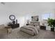 Cozy primary bedroom with a neutral color palette, plush carpeting, and plenty of natural light at 6042 Jensen View Ave, Apollo Beach, FL 33572