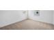 Cozy bedroom showcasing neutral carpeting, white walls and trim at 6058 Jensen View Ave, Apollo Beach, FL 33572