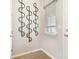 Entryway with neutral walls and a decorative mirror at 6058 Jensen View Ave, Apollo Beach, FL 33572