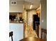 Open kitchen, black appliances and lots of counter space at 8728 Mallard Reserve Dr # 103, Tampa, FL 33614