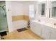Bathroom featuring modern cabinets, a glass door shower, and a separate tub at 12236 Fairlawn Dr, Riverview, FL 33579