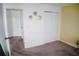 Bedroom featuring neutral carpet, a closet, and an adjacent room at 12236 Fairlawn Dr, Riverview, FL 33579