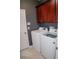 Bright laundry room with modern washer and dryer at 12236 Fairlawn Dr, Riverview, FL 33579