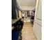 Walk-in closet with ample shelving and hanging space for organized storage at 16750 Sunburst Lake St, Wimauma, FL 33598