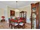 Formal dining room with a beautiful chandelier and decorative furnishings; a perfect entertaining space at 5497 56Th E Ct, Bradenton, FL 34203