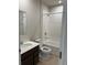 Bathroom features a shower-tub combo with white tiling and a modern vanity at 17130 11Th Ter E, Bradenton, FL 34212