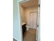 Bathroom with a single sink vanity, a toilet, and a closet with a white door at 17130 11Th Ter E, Bradenton, FL 34212