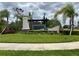 Hillwood Preserve community entrance sign with stone and wood accents surrounded by lush landscaping at 17130 11Th Ter E, Bradenton, FL 34212