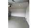 The image shows a clean and organized garage, offering ample space for parking and storage at 17130 11Th Ter E, Bradenton, FL 34212