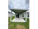 View of the covered patio area, which extends from the rear of the house at 17130 11Th Ter E, Bradenton, FL 34212