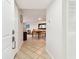 Welcoming entryway that leads to an open-concept living and dining area with tile flooring at 6151 Bahia Del Mar Blvd # 125, St Petersburg, FL 33715