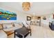 Open living space featuring tile flooring, a dining area, and views into the kitchen at 6151 Bahia Del Mar Blvd # 125, St Petersburg, FL 33715