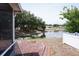 The backyard features a serene pond view, enhancing the peaceful atmosphere of the property at 10308 Soaring Eagle Dr, Riverview, FL 33578