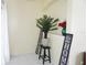 Inviting entryway with decorative accents, potted plants, and tile flooring at 10308 Soaring Eagle Dr, Riverview, FL 33578