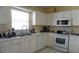 Well-maintained kitchen with ample counter space and modern appliances at 10308 Soaring Eagle Dr, Riverview, FL 33578