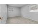 This bedroom has neutral colored walls, carpet floors, and windows that provide natural light at 4408 W Prescott St, Tampa, FL 33616