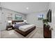 This is a bedroom with a bed, two windows, and a nightstand on each side of the bed at 4408 W Prescott St, Tampa, FL 33616