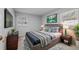 Cozy bedroom featuring modern decor, including a comfortable bed and stylish accents at 4408 W Prescott St, Tampa, FL 33616