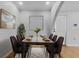 Elegant dining area features a modern table setting, stylish chairs, and bright natural light at 4408 W Prescott St, Tampa, FL 33616