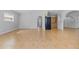Bright, empty living room with tile flooring, arched doorways, and ample natural light at 4408 W Prescott St, Tampa, FL 33616
