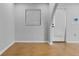 Bright, open room with tile flooring, window, and doorway, perfect for versatile living at 4408 W Prescott St, Tampa, FL 33616