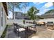 Backyard patio with a dining set, outdoor seating, and a grill perfect for entertaining guests at 4408 W Prescott St, Tampa, FL 33616