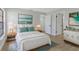Cozy bedroom with a plush bed, stylish decor, and ample natural light at 5151 Puritan Cir # 1022, Tampa, FL 33617