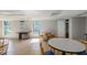 Community room with dining tables and chairs and natural light at 5151 Puritan Cir # 1022, Tampa, FL 33617