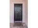 Charming front door with decorative panels and a welcoming 'Come in and Cozy up' doormat at 5151 Puritan Cir # 1022, Tampa, FL 33617