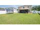 The huge backyard offers plenty of space for Gathering activities and outdoor enjoyment at 2746 Walden Woods Dr, Plant City, FL 33566