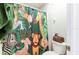 Bathroom featuring a fun animal themed shower curtain, toilet, and complimentary green towel at 2746 Walden Woods Dr, Plant City, FL 33566
