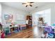 Spacious and bright living area with laminate flooring that flows into the dining area at 2746 Walden Woods Dr, Plant City, FL 33566